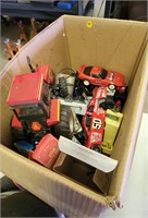 Box of misc. cars and tractor