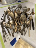 Assortment of forks, spoons, and other