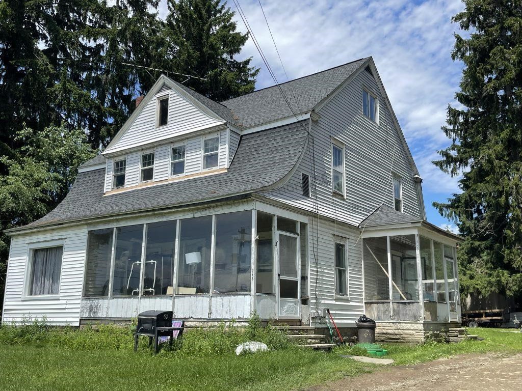 Home, Outbuildings and 5.5 +/- Acres
