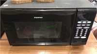 Tappan microwave oven with one touch control