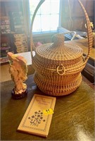 woven snake basket , Angel, and book