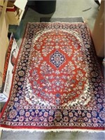 RED & TAN ORIENTAL RUG