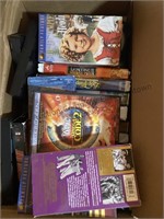 2 boxes of movies , dvd and vhs