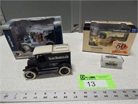 Vehicle coin banks and a small Model T in box
