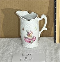 vintage porcelain figural pitcher