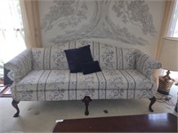 Vintage sofa with throw pillows