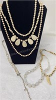 6 necklaces. Beads with toothshape- 16 inch.