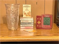 Cassette ,Plastic Vase, Game, 2 DVDs