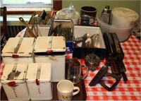 contents of table including knives, utensils,