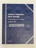 21 - Standing Liberty half dollars in book