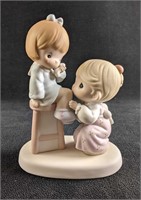 A Precious Moment Porcelain Figurine