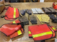 Assorted gloves and safety vests