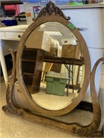 Wood carved framed mirror-24x29”