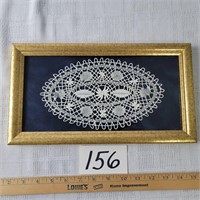 Framed Doily under Glass