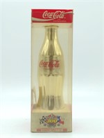 Coca-Cola 300 Gold and Silver Commemorative Bottle