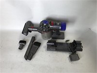 Dyson V8 with Charger & Attachments Shown