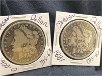 Lot of 2 Morgan silver dollars with protectors