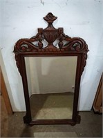 Vintage wood frame mirror measuring 22 x 40