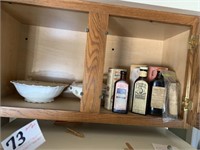 Antique Medicane Bottles in Cabinet