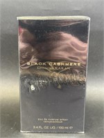 Unopened Black Cashmere by Donna Karan