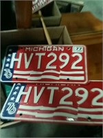 Box with Michigan license plates Etc