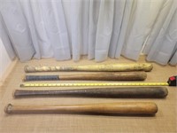 Four Old Wooden Baseball and Softball Bats