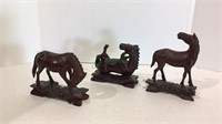 Great lot of carved wooden horses -one on his back