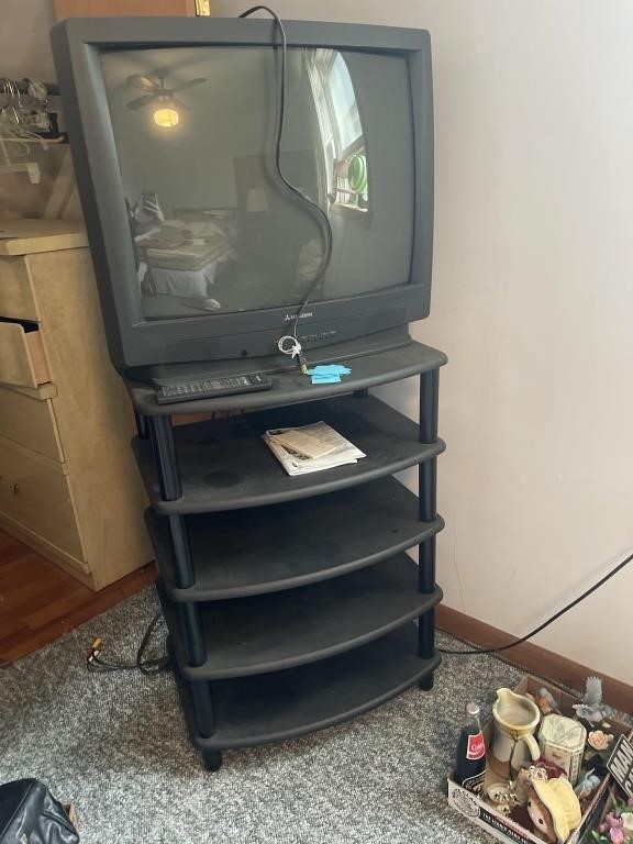 Tv stand and old tv