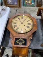 Waterbury Clock Co. antique wall clock with key