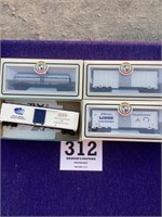 Four HO gauge rail cars