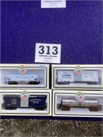 Four HO gauge rail cars