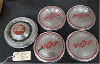 4 old Mercury hub caps + 1 GMC