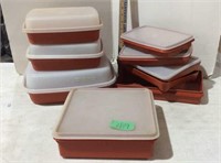 Rust colored bottom Tupperware