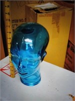 Clear blue glass head