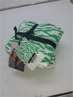 Green and white washcloths