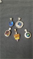Group of beautiful necklace pendants all are