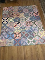 Hand stitched X quilt