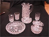 Eight pieces of cut glass: 8 1/2" serving pitcher,