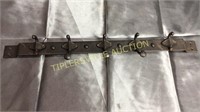 Iron coat rack missing hooks