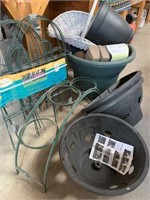 Variety of planters and garden supplies