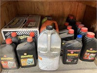 Contents of shelf. Miscellaneous oil