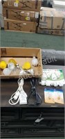 Assorted light bulbs, extension cords