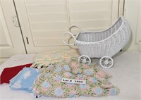 WICKER BABY STROLLER WITH BABY BLANKETS AND FABRIC
