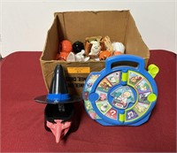 Group of Halloween toys and Fisher Price Animal