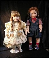 2 collector dolls that are numbered