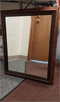 Beautiful framed mirror. 20.5 x 23.75 inches.
