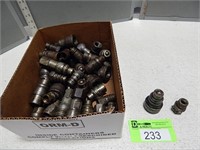Assorted sizes of quick release couplers and other