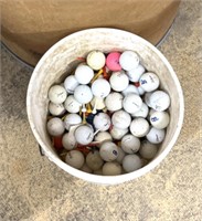 Pale full of golf balls