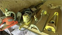 Grouping of pump hedge trimmer and contents