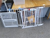 3 Pet gates, and a crate barrier r 1 gate missing